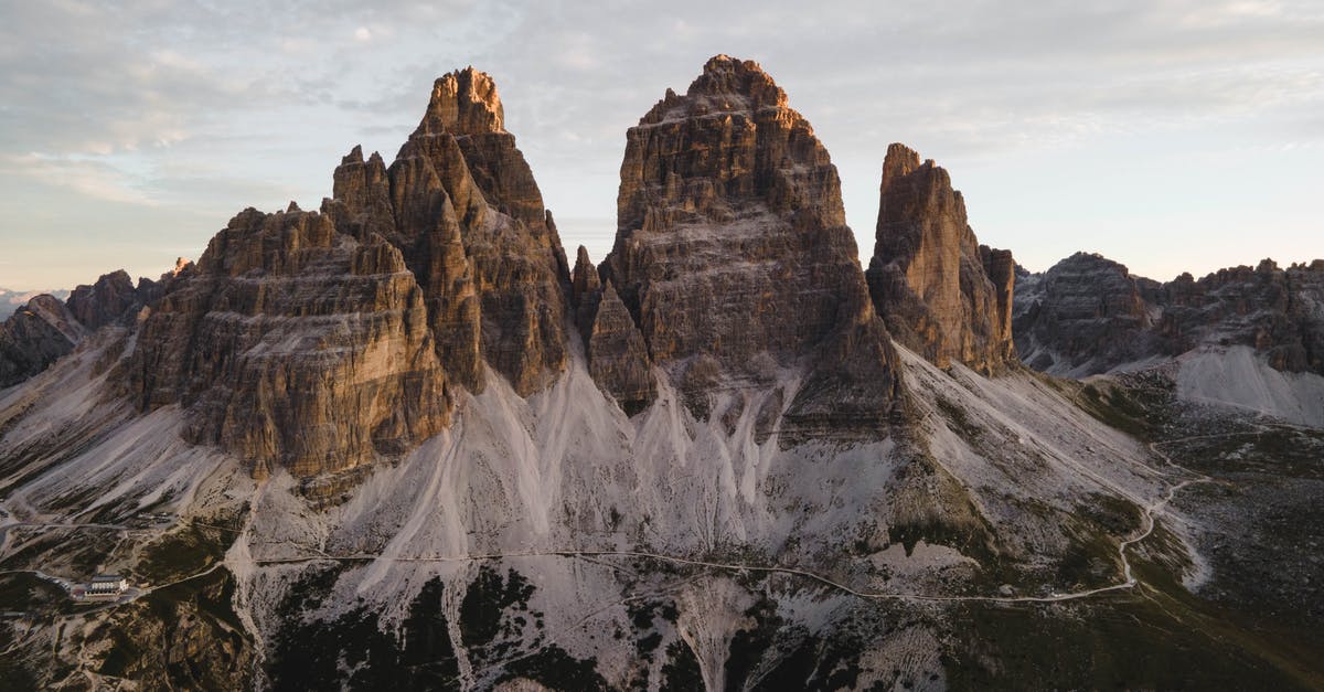 Re-Entry in Italy (lost residence permit before leaving italy - permesso di soggiorno) [duplicate] - Snow Covered Mountain Under Cloudy Sky