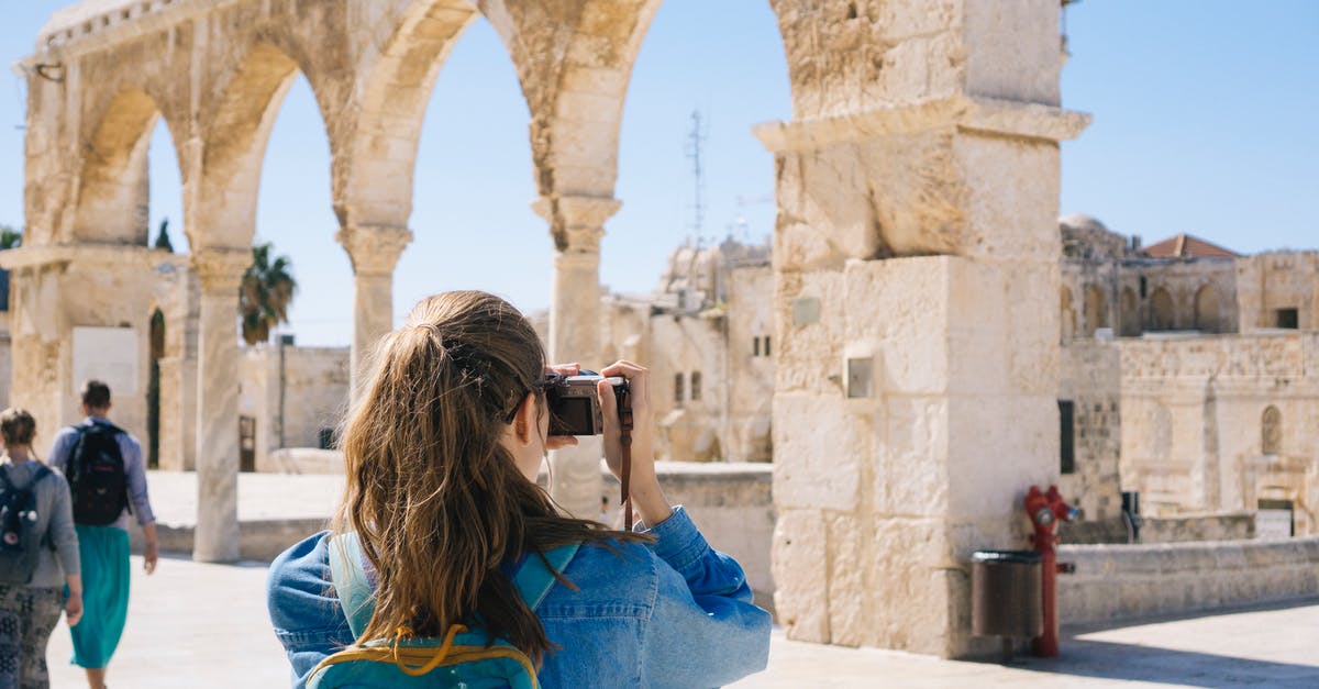 Re-entry into Israel as tourist (Australian citizen) - Woman Taking Pictures of Ruins Re-entry into Israel as tourist (Australian citizen) - Woman Taking Pictures of Ruins