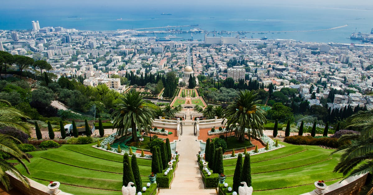 Re-entry into Israel as tourist (Australian citizen) - Panoramic View of Hedge and Raw Houses Across Large Body of Water Re-entry into Israel as tourist (Australian citizen) - Panoramic View of Hedge and Raw Houses Across Large Body of Water