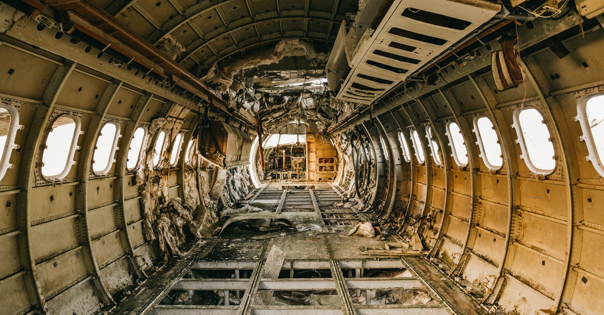 Refund for damaged luggage - Interior of crashed aircraft cabin with windows Refund for damaged luggage - Interior of crashed aircraft cabin with windows