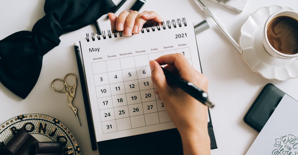 Refusal of Entry A Few Days Before Visa D Validity - A Person Writing on a Desk Calendar Refusal of Entry A Few Days Before Visa D Validity - A Person Writing on a Desk Calendar