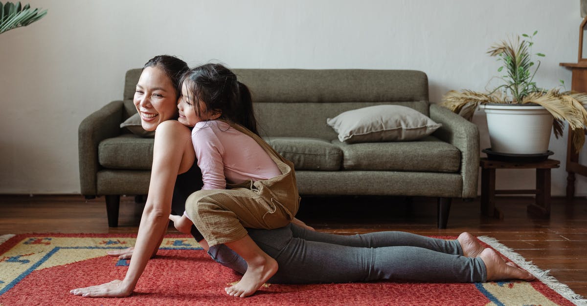 Refused family ticket due to not being a "family" - Photo of Girl Hugging Her Mom While Doing Yoga Pose Refused family ticket due to not being a "family" - Photo of Girl Hugging Her Mom While Doing Yoga Pose