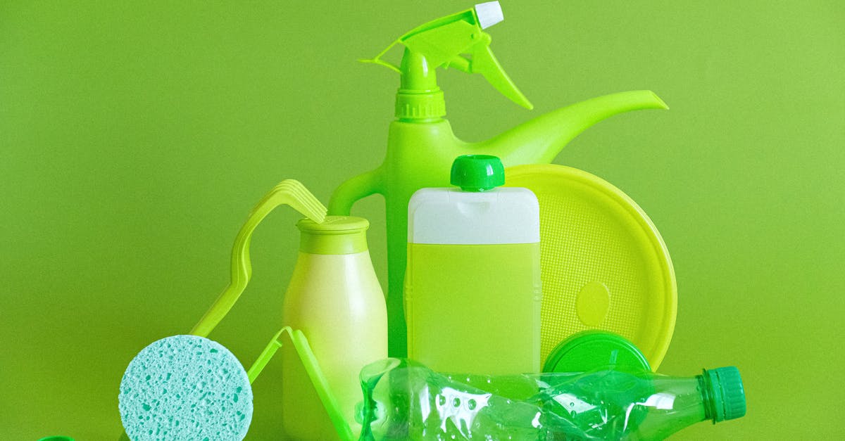 Refused UK visit visa TWICE but my circumstance is very different [duplicate] - Monochrome green bottles and containers for liquids or gel with plastic bottle and lids on green background