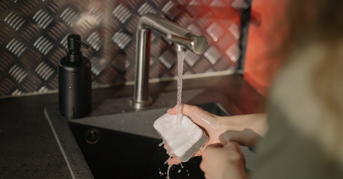 Regulations regarding cleaning of plane water cooking equipment? - Person Holding White Paper Near Stainless Steel Faucet Regulations regarding cleaning of plane water cooking equipment? - Person Holding White Paper Near Stainless Steel Faucet