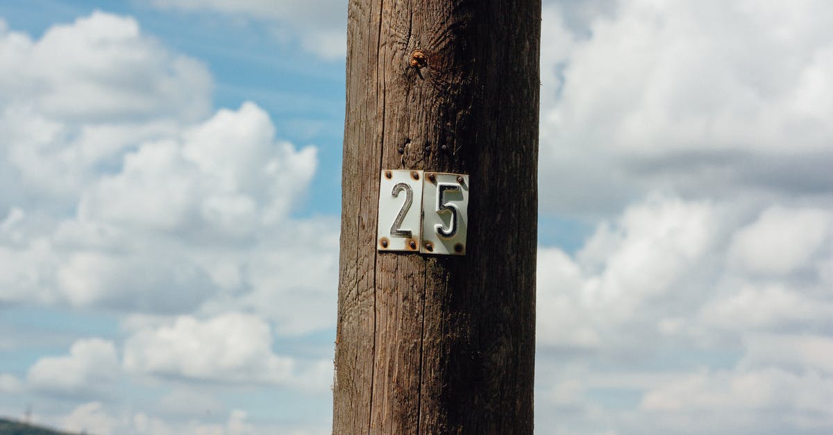 Reinstate Known Traveller Number - White Metal 25-embossed Signage on Post