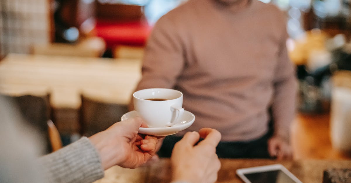 Reliability of prepaids for foreign calls such as Lebara, Ortel... what to take into account? [closed] - Crop couple having breakfast together with coffee at home