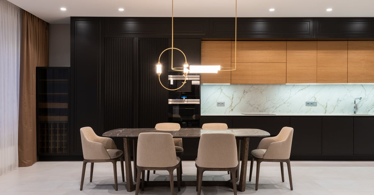 Renewing Azerbaijani temporary residence on a new passport - Flat with table and chairs near open kitchen Renewing Azerbaijani temporary residence on a new passport - Flat with table and chairs near open kitchen