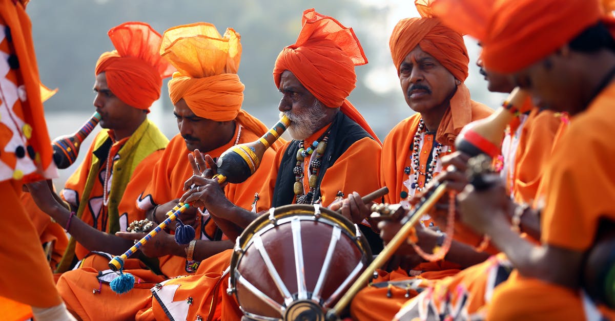 Renewing my Indian passport in India as an NRI - Men in Orange Costumes Playing Instruments Renewing my Indian passport in India as an NRI - Men in Orange Costumes Playing Instruments