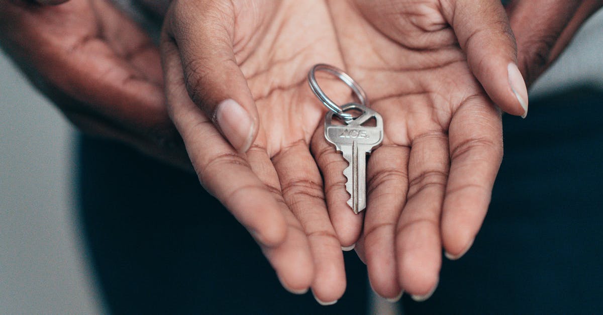 Rent a car at Palm Springs airport - Key on a Person's Palm Rent a car at Palm Springs airport - Key on a Person's Palm