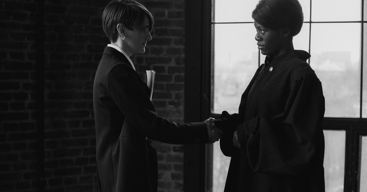rental agreement for UK standard visitor visa - A Grayscale of a Woman Wearing a Suit in Agreement with a Judge rental agreement for UK standard visitor visa - A Grayscale of a Woman Wearing a Suit in Agreement with a Judge