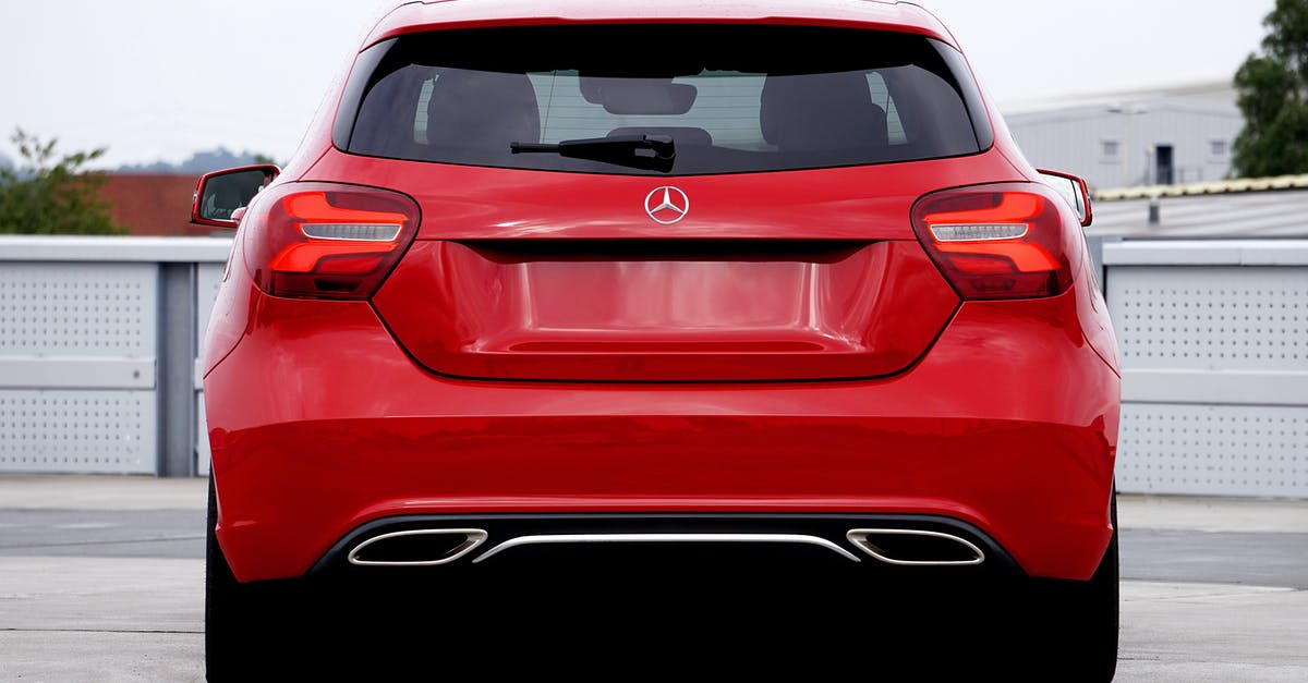 Rented a 9 seater Mercedes-Benz GL but: 'There is no such car' [closed] - Red Car Parked on the Street