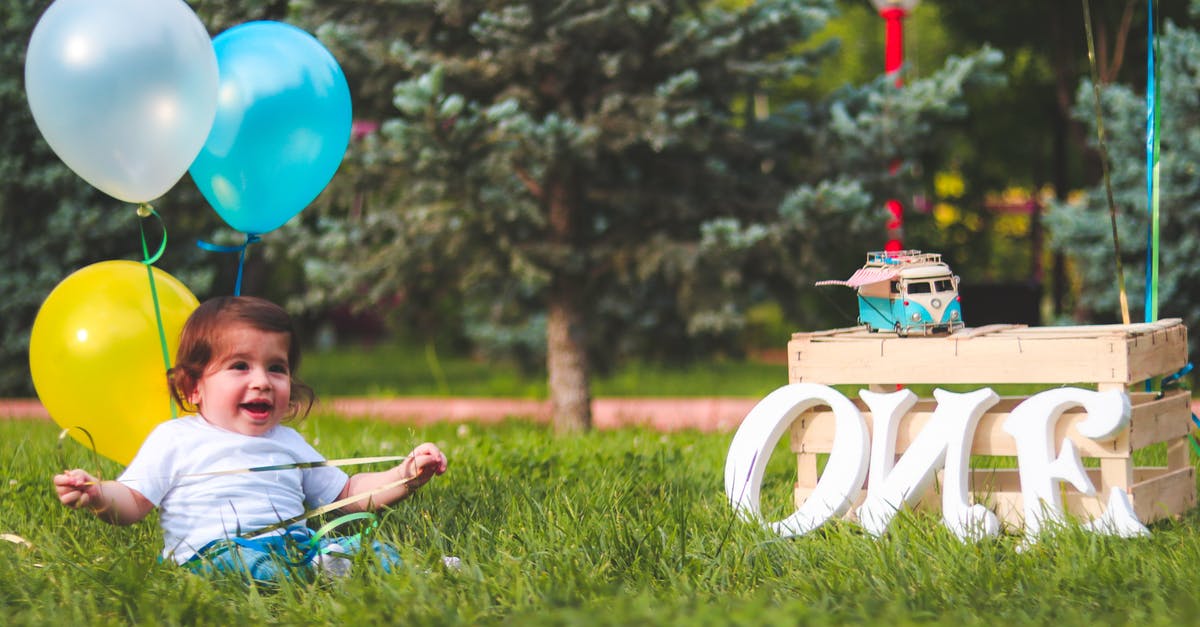 Renting a car in one country and return it in another one (Europe) - Girl Holding Blue and Yellow Balloons Renting a car in one country and return it in another one (Europe) - Girl Holding Blue and Yellow Balloons