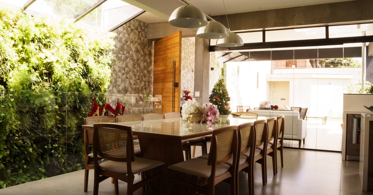 Renting a flat or rooms in the Alps area for winter season [closed] - Stylish interior of modern apartment with Christmas decorations