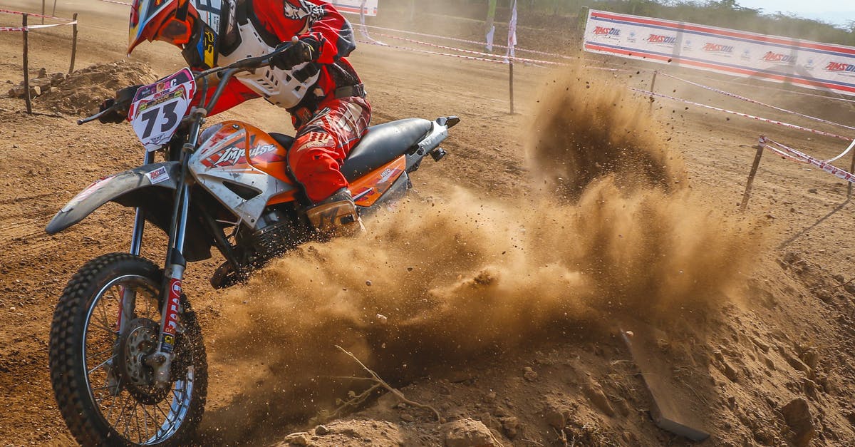 Renting a motorbike from a private person in Indonesia? - Man Riding Motocross Dirt Bike on Dirt Road Renting a motorbike from a private person in Indonesia? - Man Riding Motocross Dirt Bike on Dirt Road