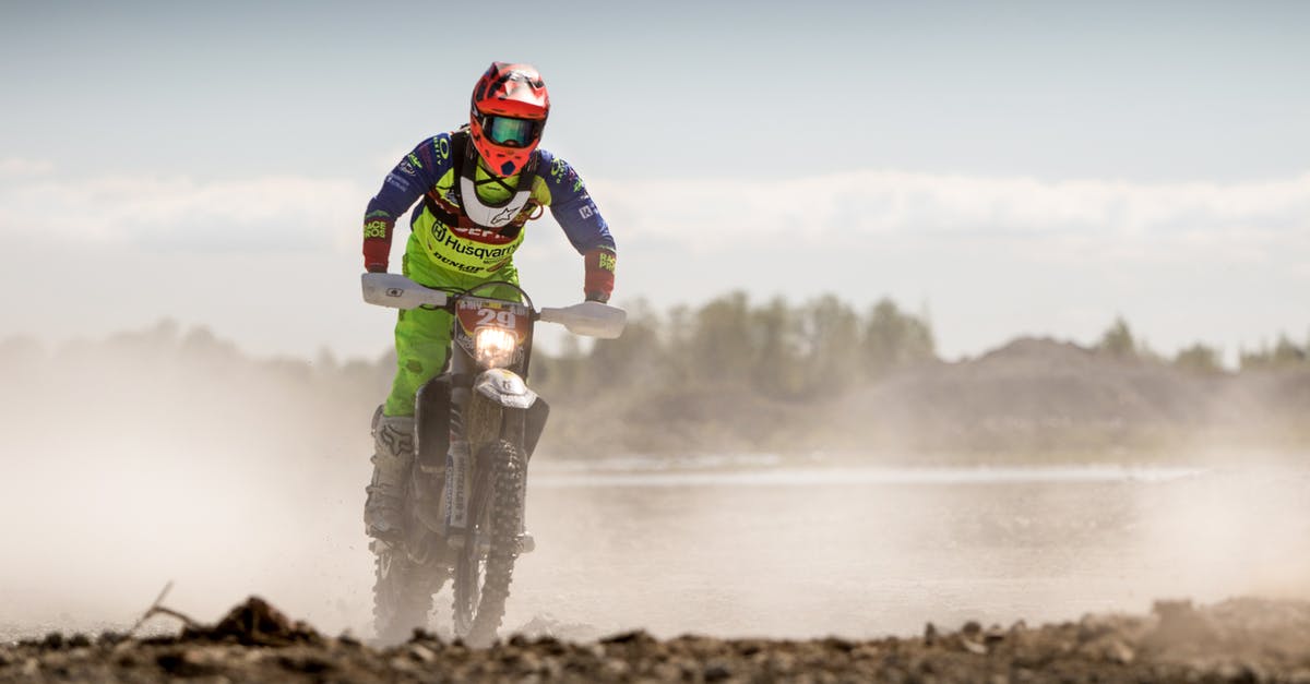 Renting a motorbike from a private person in Indonesia? - Person In Green Motocross Gear Riding A Dirt Bike Renting a motorbike from a private person in Indonesia? - Person In Green Motocross Gear Riding A Dirt Bike