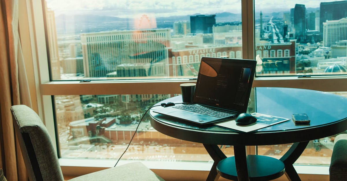 Renting personal laptop in Las Vegas? - Macbook Pro on Table Renting personal laptop in Las Vegas? - Macbook Pro on Table