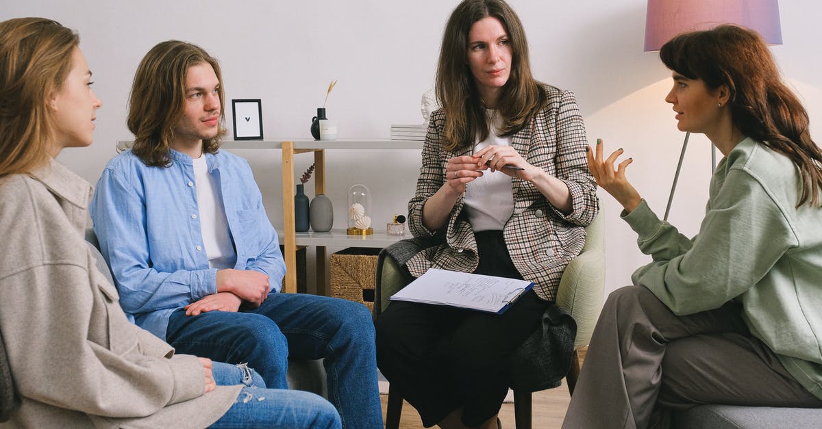 Require Help and Opinion on B2 visa reapplication - Woman discussing problem during group therapy Require Help and Opinion on B2 visa reapplication - Woman discussing problem during group therapy