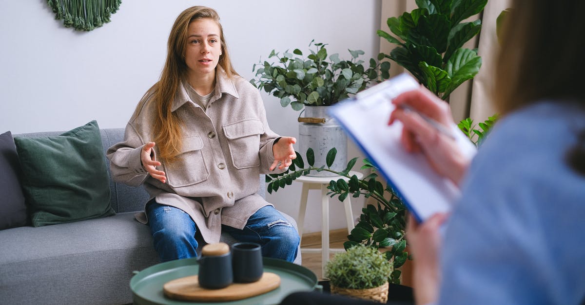 Require Help and Opinion on B2 visa reapplication - Woman explaining problems to crop psychologist Require Help and Opinion on B2 visa reapplication - Woman explaining problems to crop psychologist