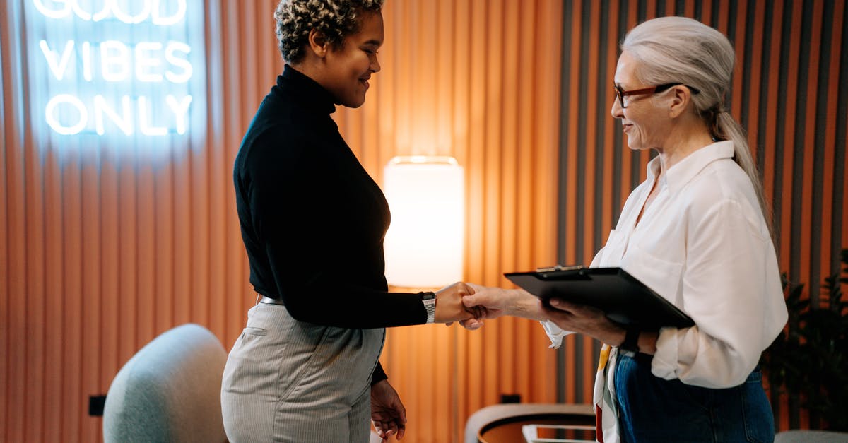 Required visa for work-at-home (abroad) person visiting his/her employer in US - Woman in Black Long Sleeve Shirt Had a Job Interview Required visa for work-at-home (abroad) person visiting his/her employer in US - Woman in Black Long Sleeve Shirt Had a Job Interview