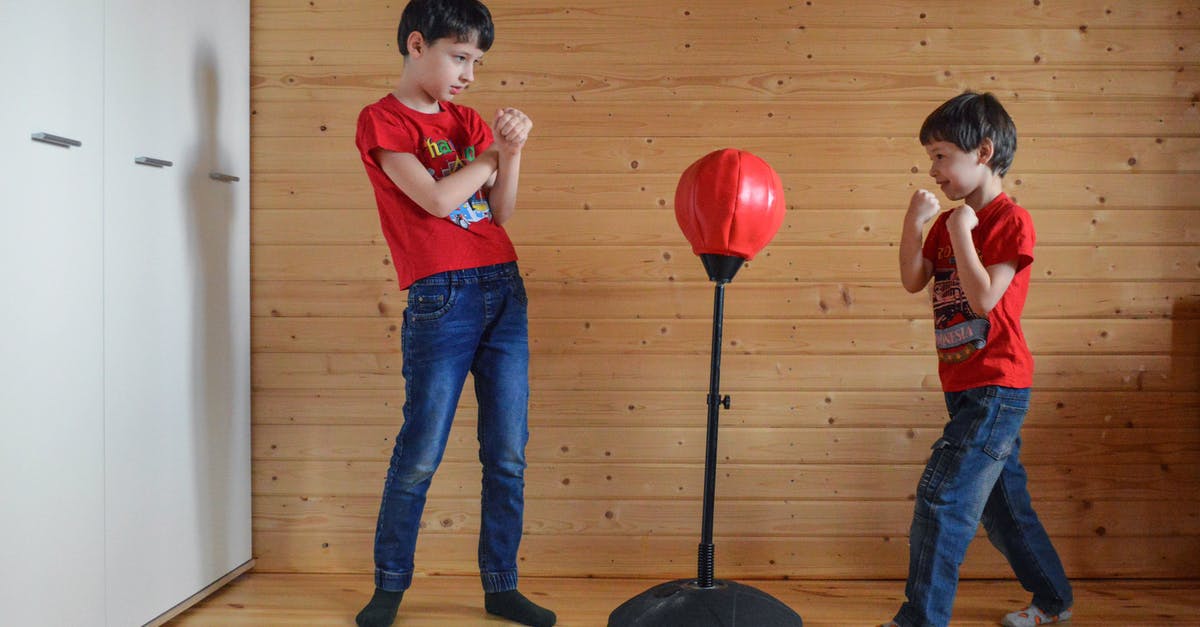 Reservations on TGV when delays require a different train? - Boys playing with punching bag on stand in boxing club Reservations on TGV when delays require a different train? - Boys playing with punching bag on stand in boxing club