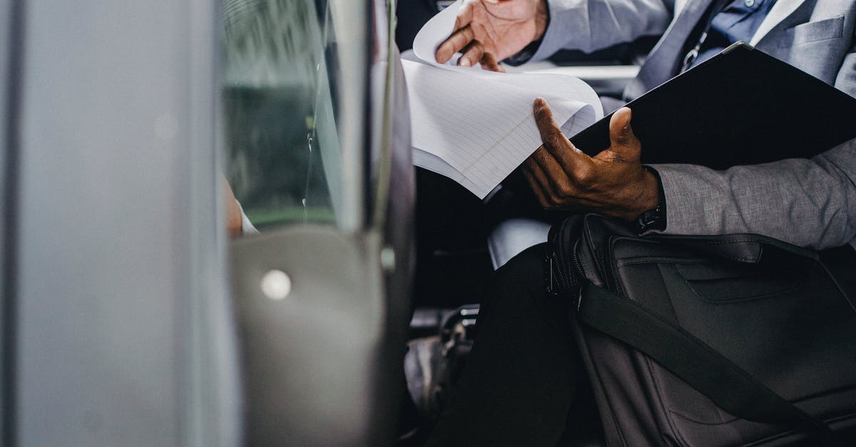 Return ticket and bank statements: are these the most important criterion for passing the UK border check? How to prepare well in advance? - Black businessman reading documents in folder in car Return ticket and bank statements: are these the most important criterion for passing the UK border check? How to prepare well in advance? - Black businessman reading documents in folder in car