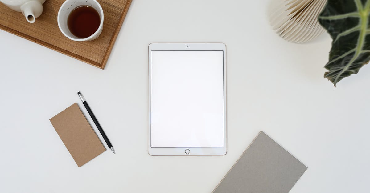 Return ticket...but not using departure element - Light workplace with tablet with blank screen Return ticket...but not using departure element - Light workplace with tablet with blank screen
