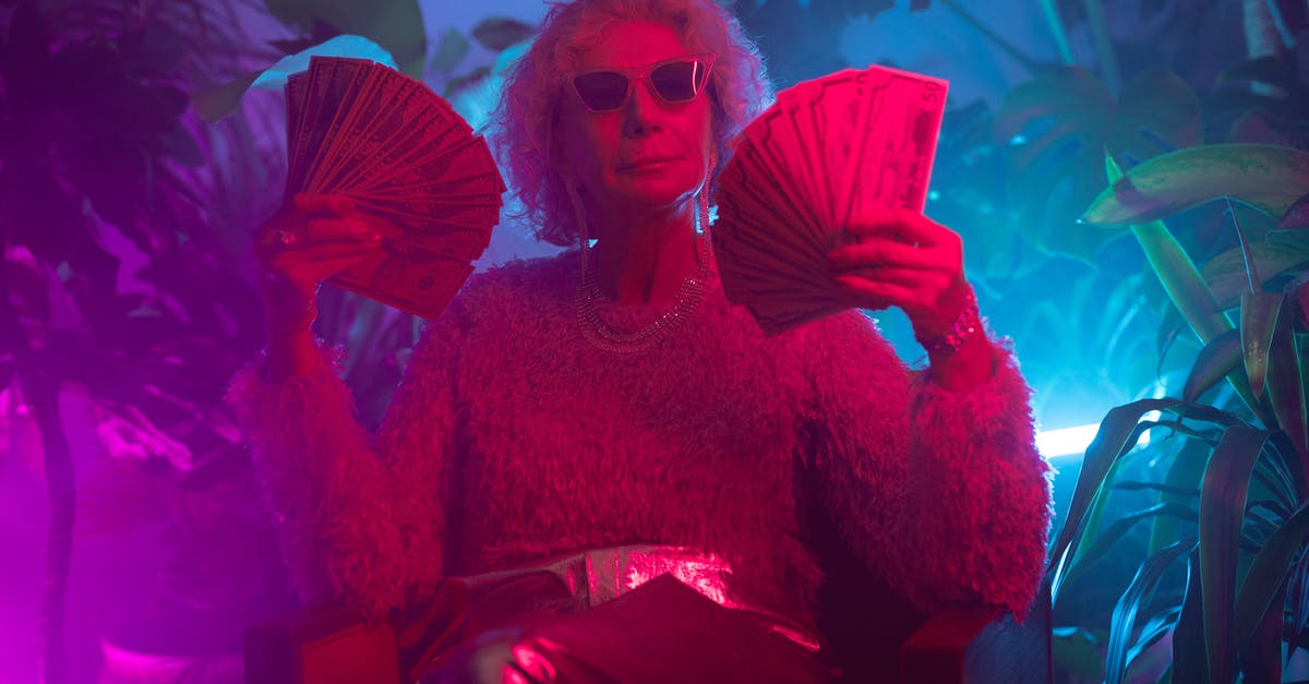Returning by VWP after 60 days? - Photo of an Elderly Woman Holding Money Returning by VWP after 60 days? - Photo of an Elderly Woman Holding Money