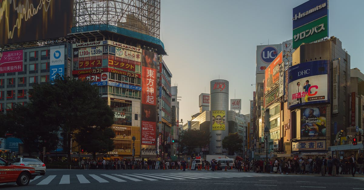 Returning to Japan with an expired re-entry permit - Brown Concrete Building Near Green Trees