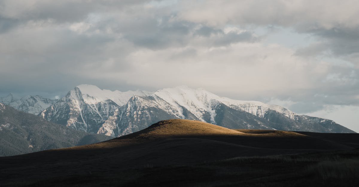 Returning to Schengen Area Visa Questions - Snow Covered Mountains Under Cloudy Sky Returning to Schengen Area Visa Questions - Snow Covered Mountains Under Cloudy Sky