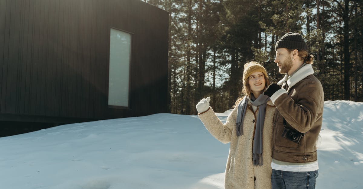 Revealing relationship on German visa application - Man in Brown Coat Standing on Snow Covered Ground Revealing relationship on German visa application - Man in Brown Coat Standing on Snow Covered Ground