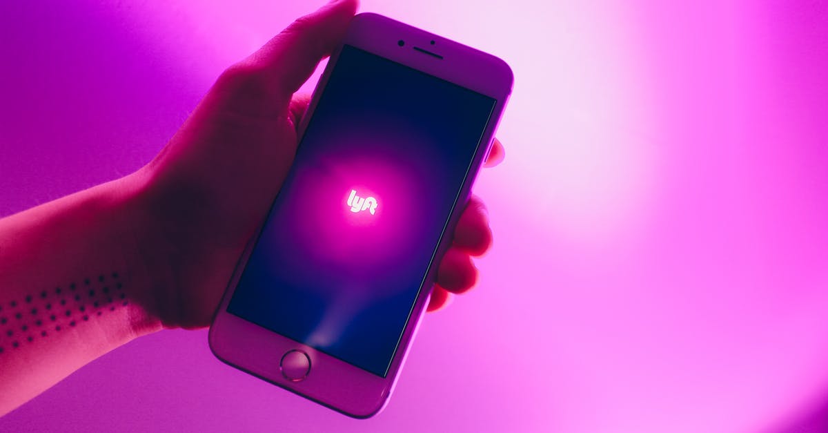 Rideshare etiquette (Lyft, Uber, etc) - Photo of Person Holding iPhone Rideshare etiquette (Lyft, Uber, etc) - Photo of Person Holding iPhone