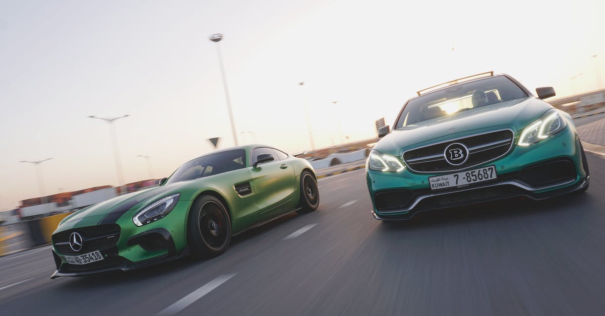 Roadtrip coast to coast in the USA, let someone else drive car back - Modern vehicles on asphalt road in city Roadtrip coast to coast in the USA, let someone else drive car back - Modern vehicles on asphalt road in city