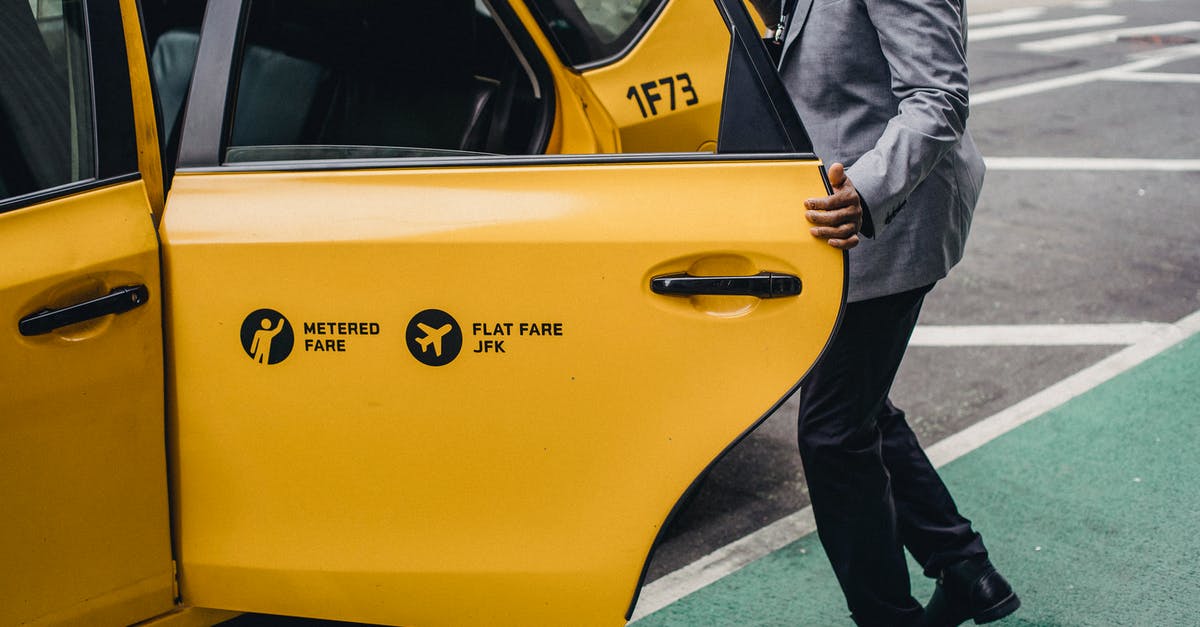 Roland-Garros (French Open) public viewing in Paris? - Crop faceless black man opening taxi door Roland-Garros (French Open) public viewing in Paris? - Crop faceless black man opening taxi door