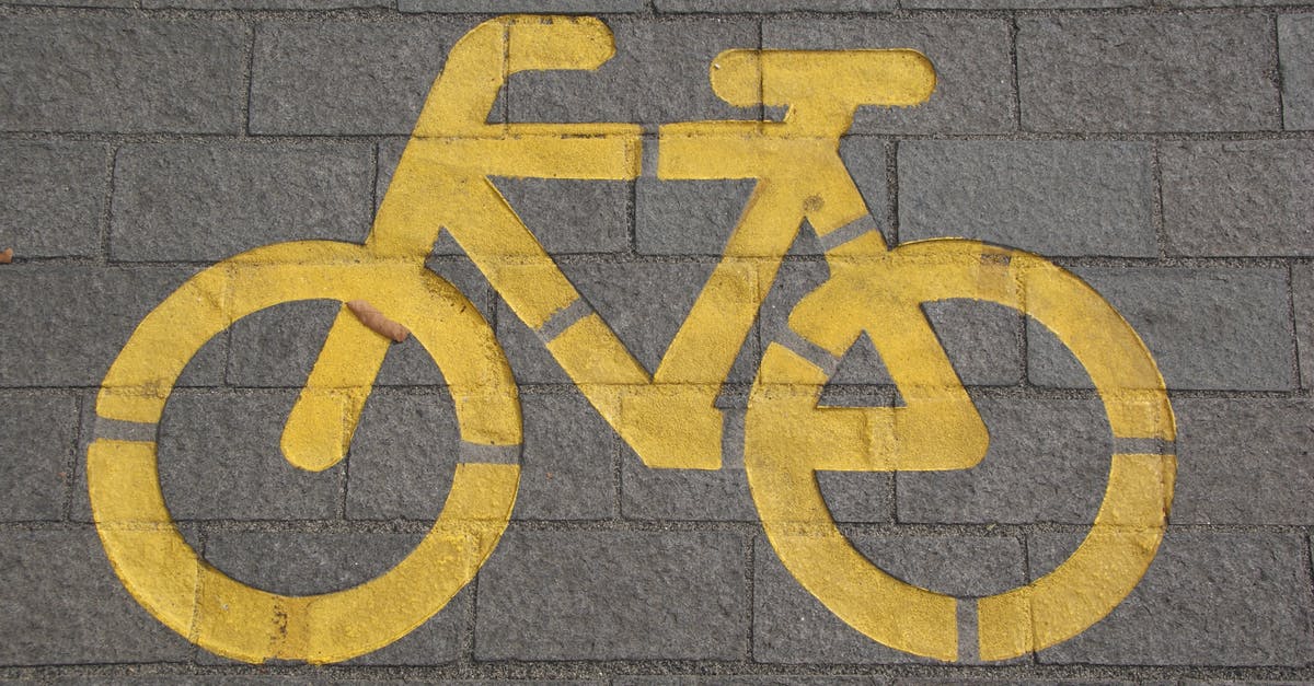 Route planner with heights (for bikes) - Bicycle Lane on Gray Concrete Road Route planner with heights (for bikes) - Bicycle Lane on Gray Concrete Road