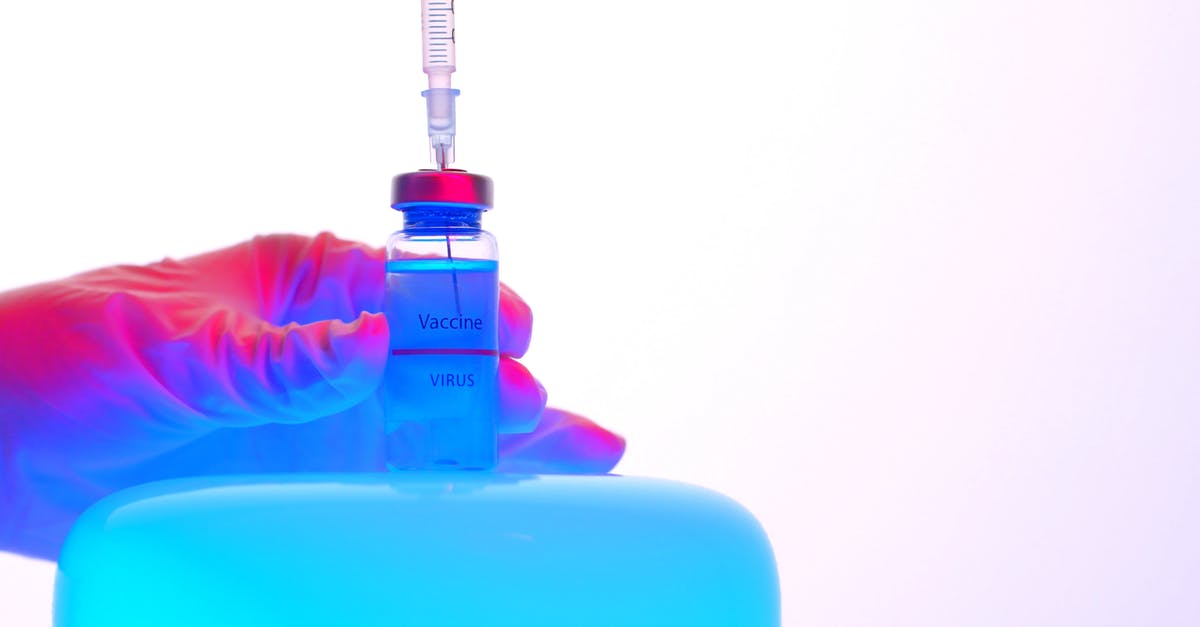RT-PCR v PCR Test for entry into Belarus - A Person Holding a Syringe and a Vial RT-PCR v PCR Test for entry into Belarus - A Person Holding a Syringe and a Vial