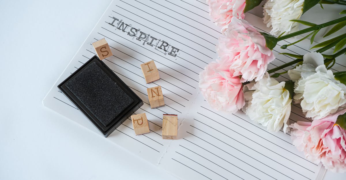 Rules or regulations on how stamps are stamped on passports? - Black Notebook on White Table