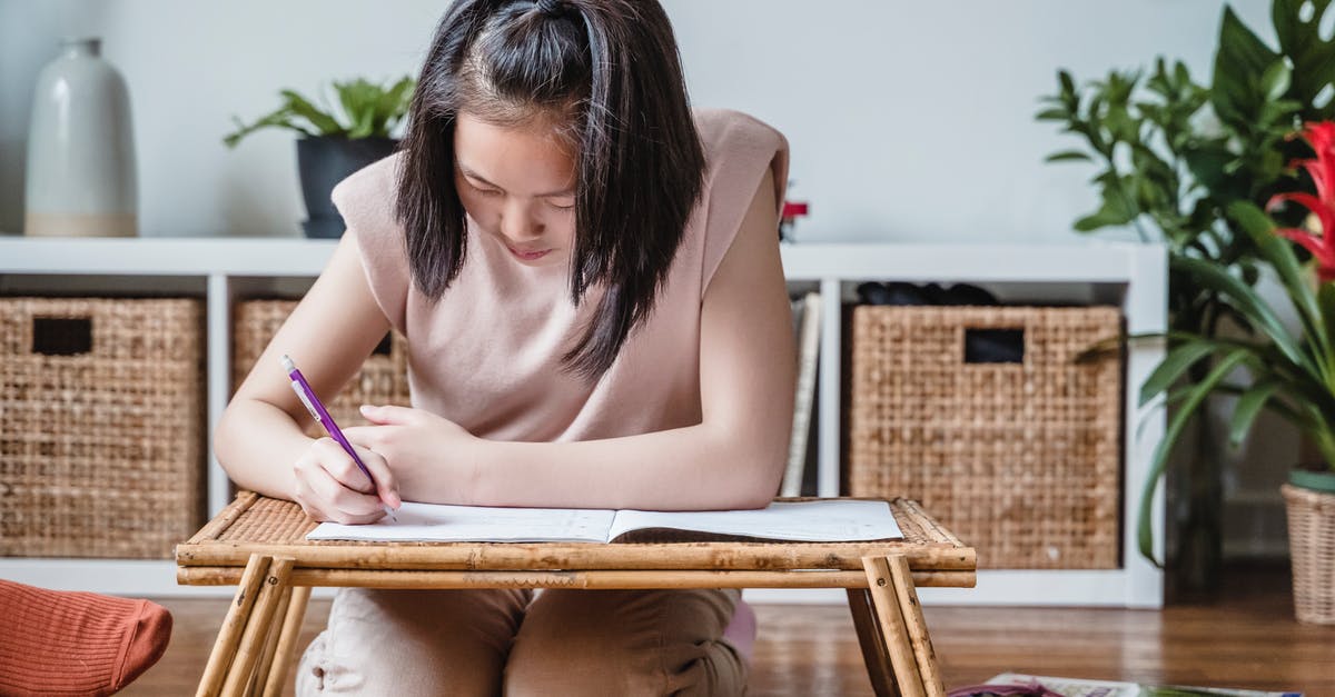 Russian student visa - A Girl Doing her Homework on a Bed Tray Russian student visa - A Girl Doing her Homework on a Bed Tray