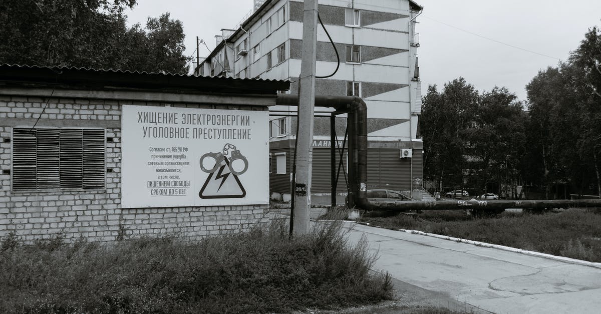 Russian Visa Duration - Warning on Wall in Town Russian Visa Duration - Warning on Wall in Town