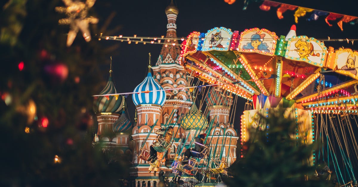 Russian visa registration requirement - Colorful carousel against Cathedral on Red Square at New Year night Russian visa registration requirement - Colorful carousel against Cathedral on Red Square at New Year night