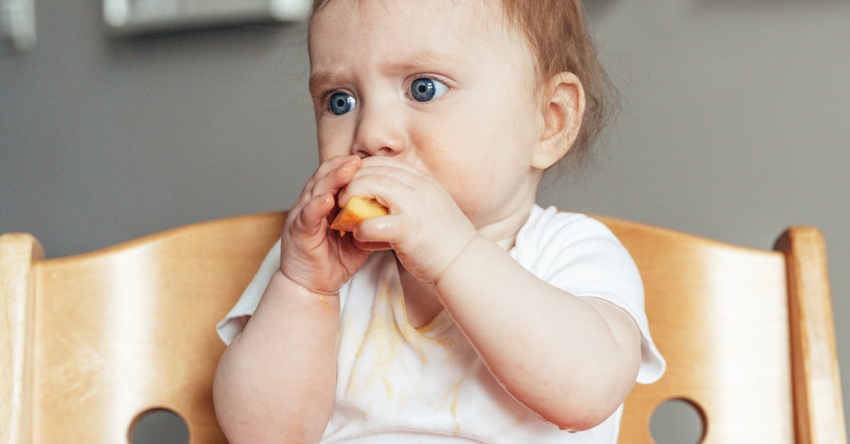 Ryanair seating allocation - Baby Sitting in a Feeding Chair and Eating Ryanair seating allocation - Baby Sitting in a Feeding Chair and Eating