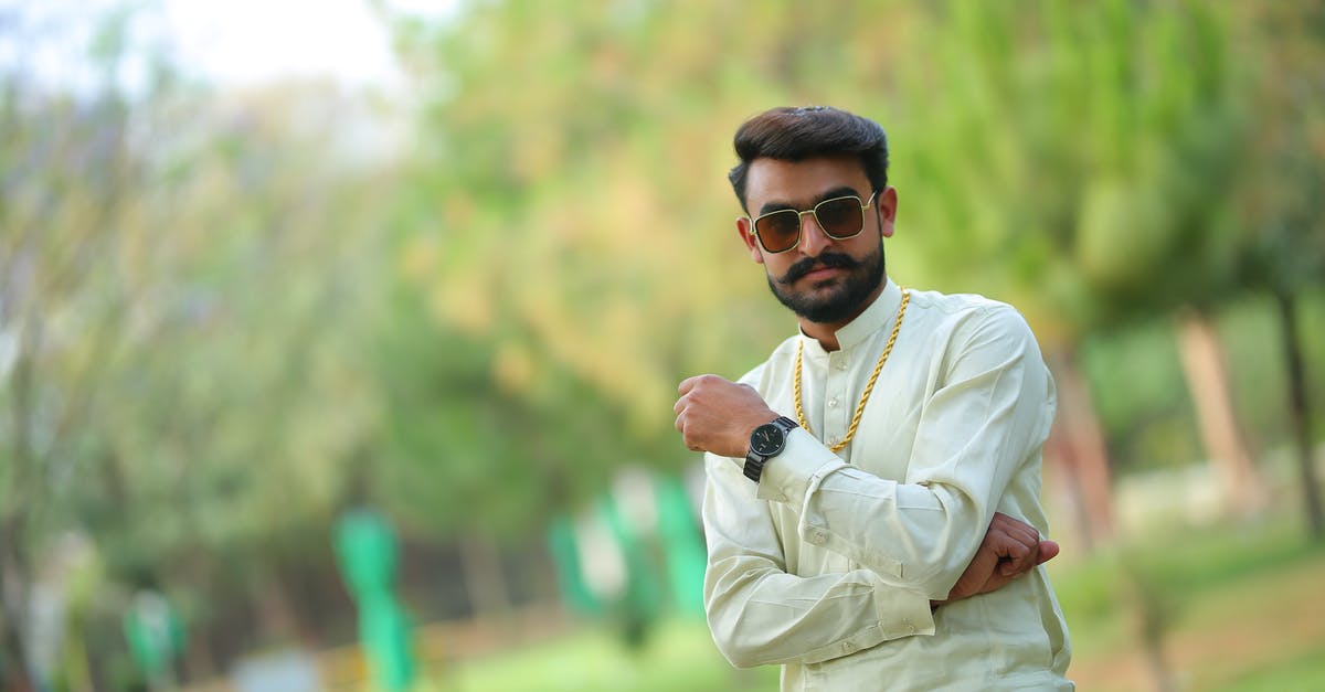 SAARC countries visited on Indian visa - Man Wearing a Gold Necklace and Sunglasses SAARC countries visited on Indian visa - Man Wearing a Gold Necklace and Sunglasses