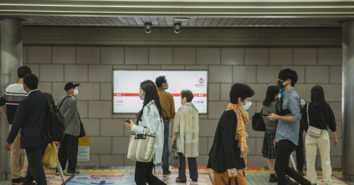 Safe to have flight stops at Istanbul? - Ethnic people walking in underground passage in masks Safe to have flight stops at Istanbul? - Ethnic people walking in underground passage in masks