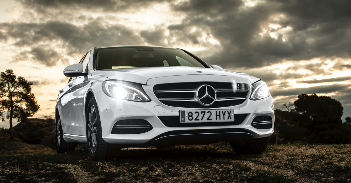 Safely driving a car in Romania with foreign plates - White Mercedes-benz Sedan