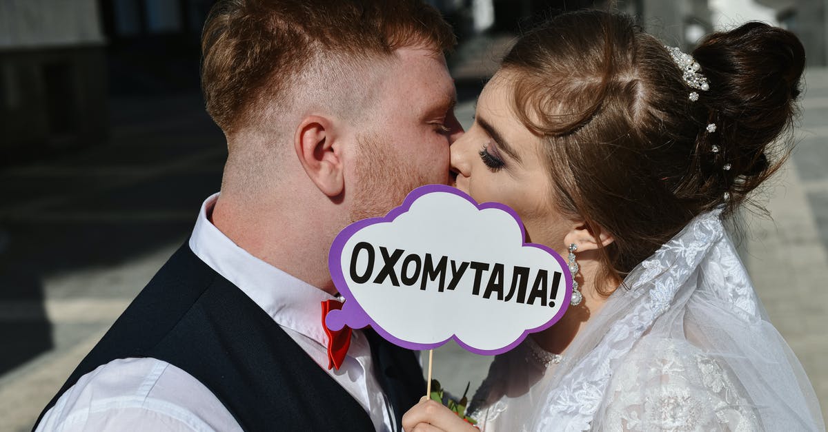 Same-sex marriage in Paris? - Man in Black Suit Kissing Woman in White Wedding Dress
