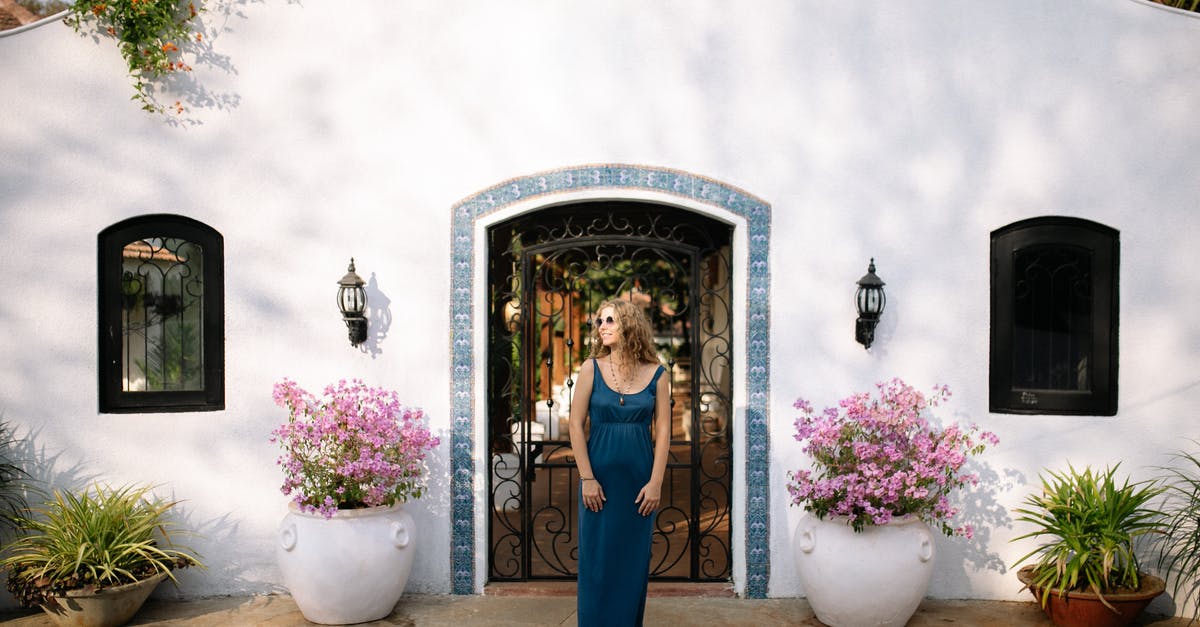 Schengen Greece Visa/passport withdrawal process - Woman in Blue Dress Standing in Front of Mirror Schengen Greece Visa/passport withdrawal process - Woman in Blue Dress Standing in Front of Mirror