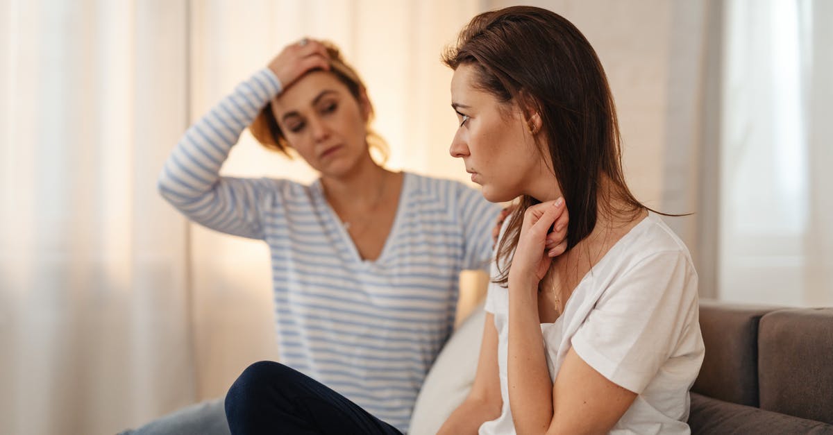 Schengen visa - worried about being refused - Worried Woman Sitting on a Sofa Schengen visa - worried about being refused - Worried Woman Sitting on a Sofa