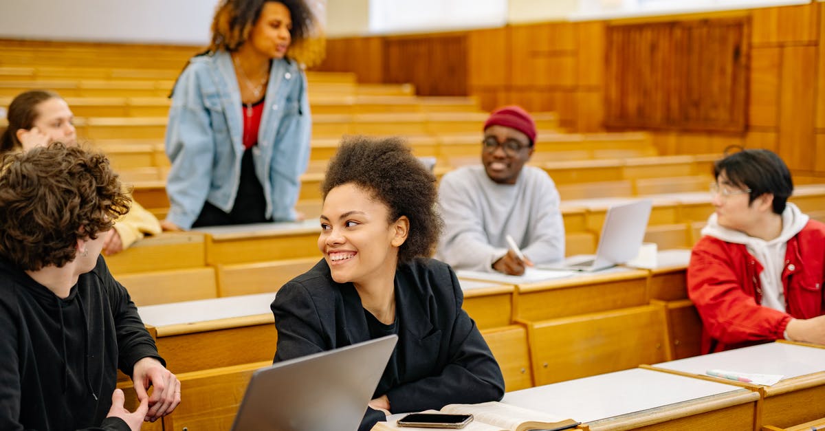 Schengen Visa and International Students - Man in Black Long Sleeve Shirt Using Macbook Schengen Visa and International Students - Man in Black Long Sleeve Shirt Using Macbook