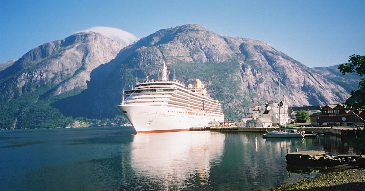 Schengen visa approved by French embassy, verbally asking to not enter Norway - White Cruise Ship on Water Near Mountain Schengen visa approved by French embassy, verbally asking to not enter Norway - White Cruise Ship on Water Near Mountain