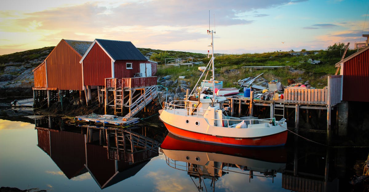 Schengen visa approved by French embassy, verbally asking to not enter Norway - Red and White Boat on Dock Schengen visa approved by French embassy, verbally asking to not enter Norway - Red and White Boat on Dock