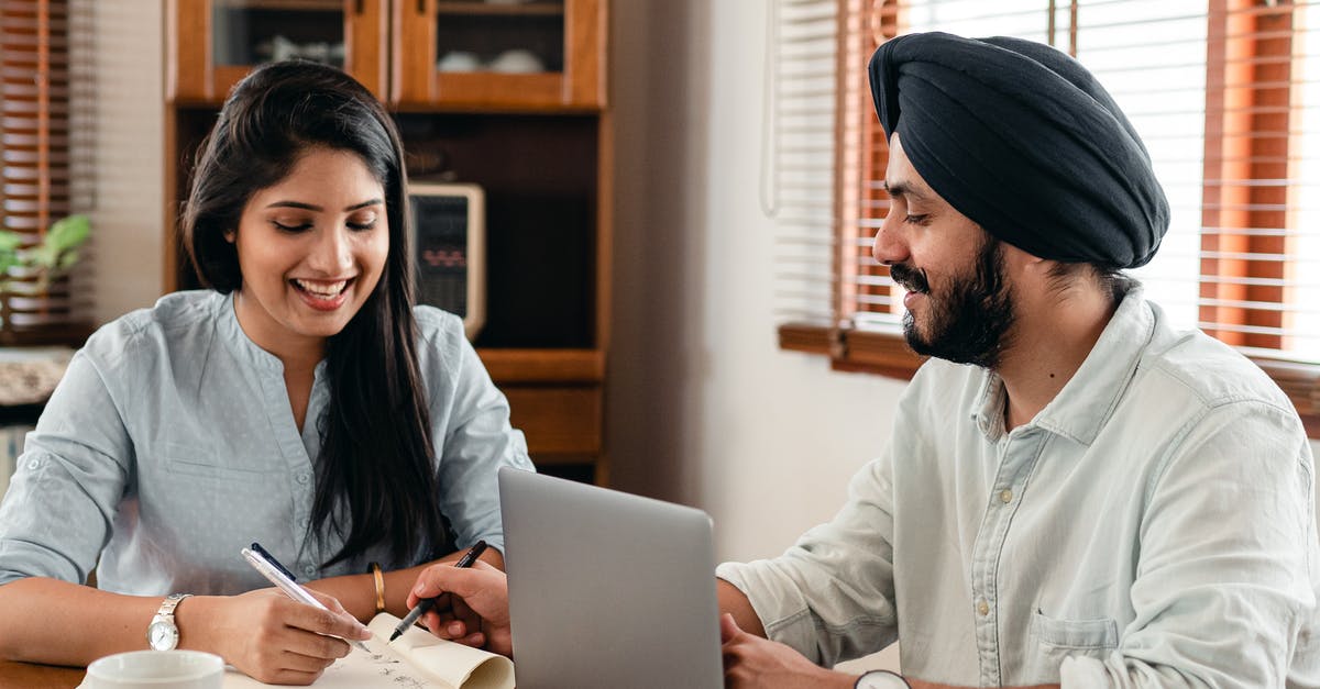 Schengen visa for an Indian student in Ireland - Happy Indian couple using laptop while doing homework together Schengen visa for an Indian student in Ireland - Happy Indian couple using laptop while doing homework together